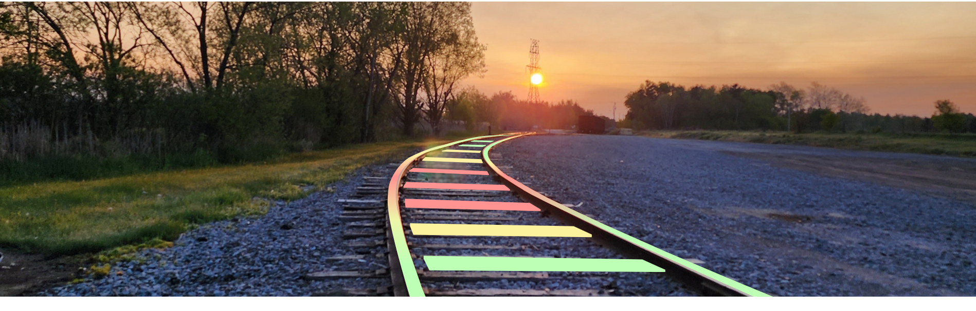 Track temperature sensing with color-coded rails at sunset