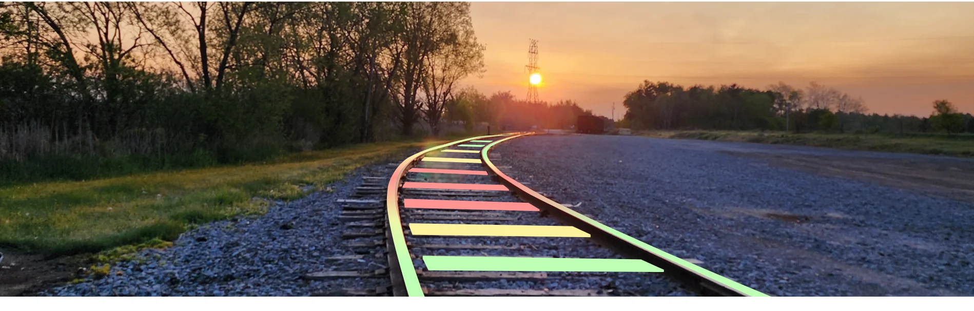 Track temperature sensing with color-coded rails at sunset